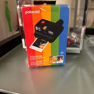 Polaroid Go Instant Camera - Black second generation. Includes 16 go photos.